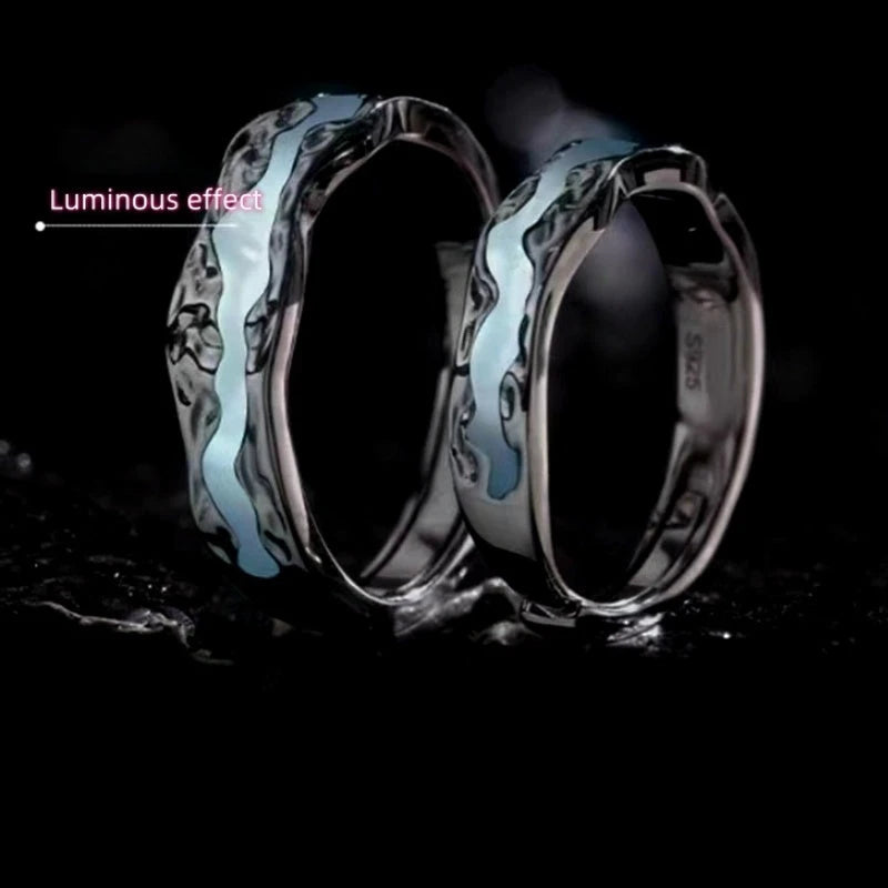 Sterling Silver Adjustable Luminous Couple Rings worn on the hand to show its beautiful fit and design