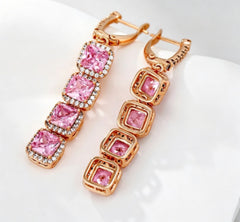 Rose gold pink halo drop earrings, front and back view showing reverse setting detail