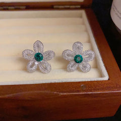 Angled view of the 14K Gold-Plated Elegant Zircon Hollow Flower Stud Earrings
