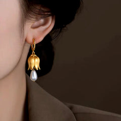 Close-up detail of the sparkling zircons and plating on the Lily Pearl Earrings