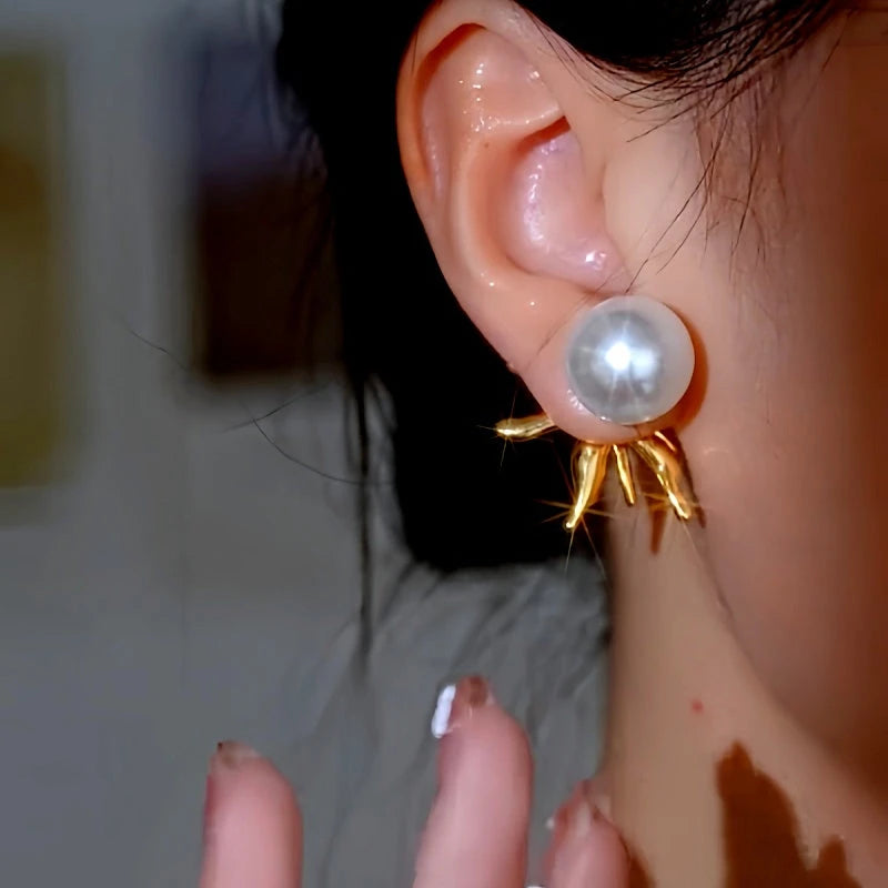 Close-up detail of the sparkling zircons and plating on the Flower Pearl Earrings