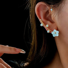 Angled view of the 14K Gold-plated Flower Pearl Ear Cuffs ( 1 Pair )