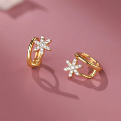 Model showcasing the dangle and style of the Sterling Silver Elegant Double-Layer Zircon Star Stud Earrings