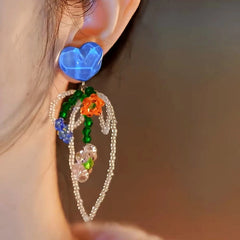 Close-up detail of the sparkling zircons and plating on the Beaded Tassel Earrings
