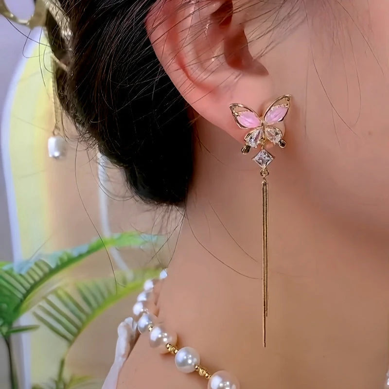 Close-up detail of the sparkling zircons and plating on the Pink Tassel Earrings