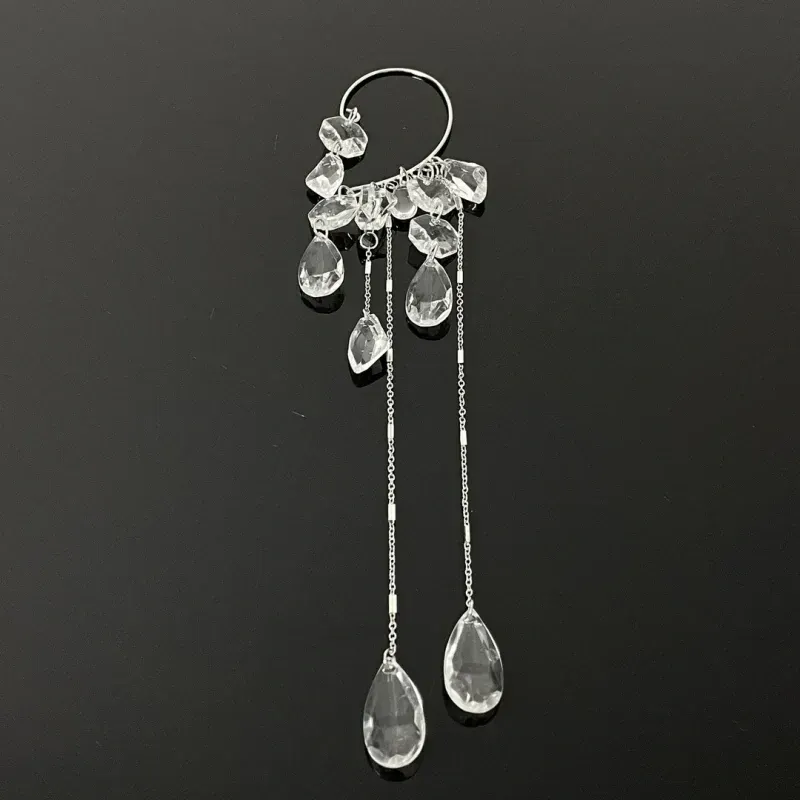 Close-up detail of the sparkling zircons and plating on the Water Drop Ear Cuff