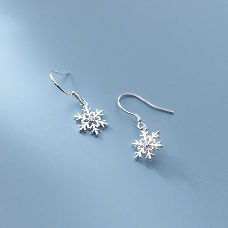 Close-up detail of the sparkling zircons and plating on the Snowflake Ear Hooks