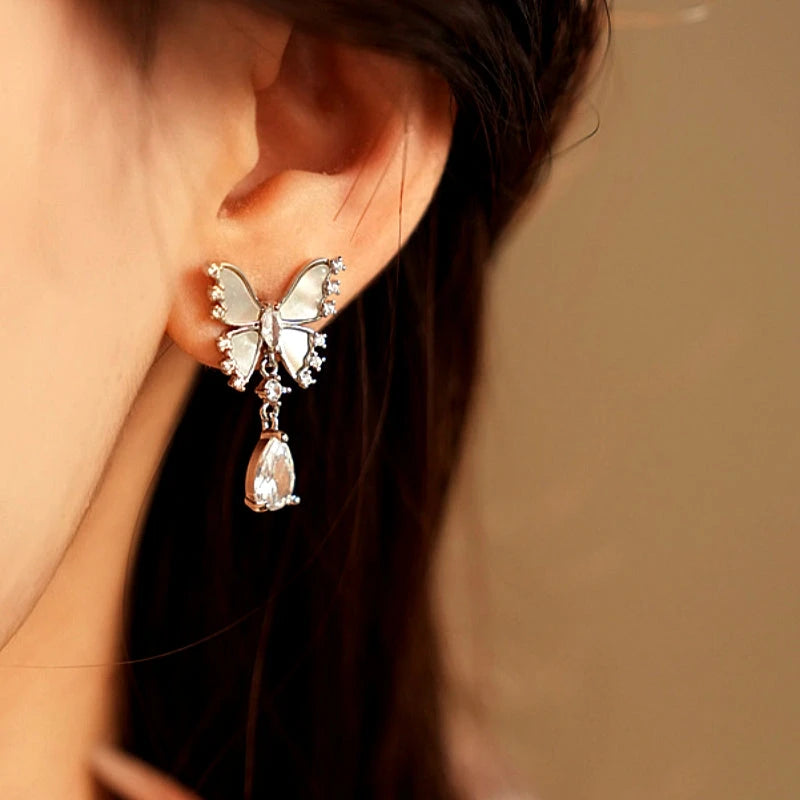 Close-up detail of the sparkling zircons and plating on the Silver Tassel Earrings