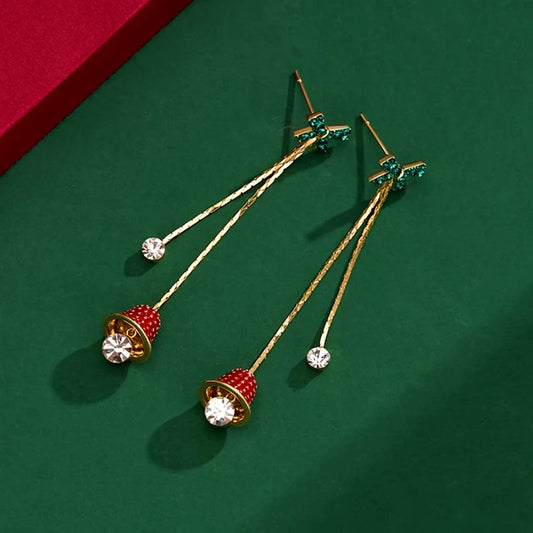 Model showcasing the dangle and style of the 14K Gold-Plated Christmas Zircon Bell Bow Tassel Earrings