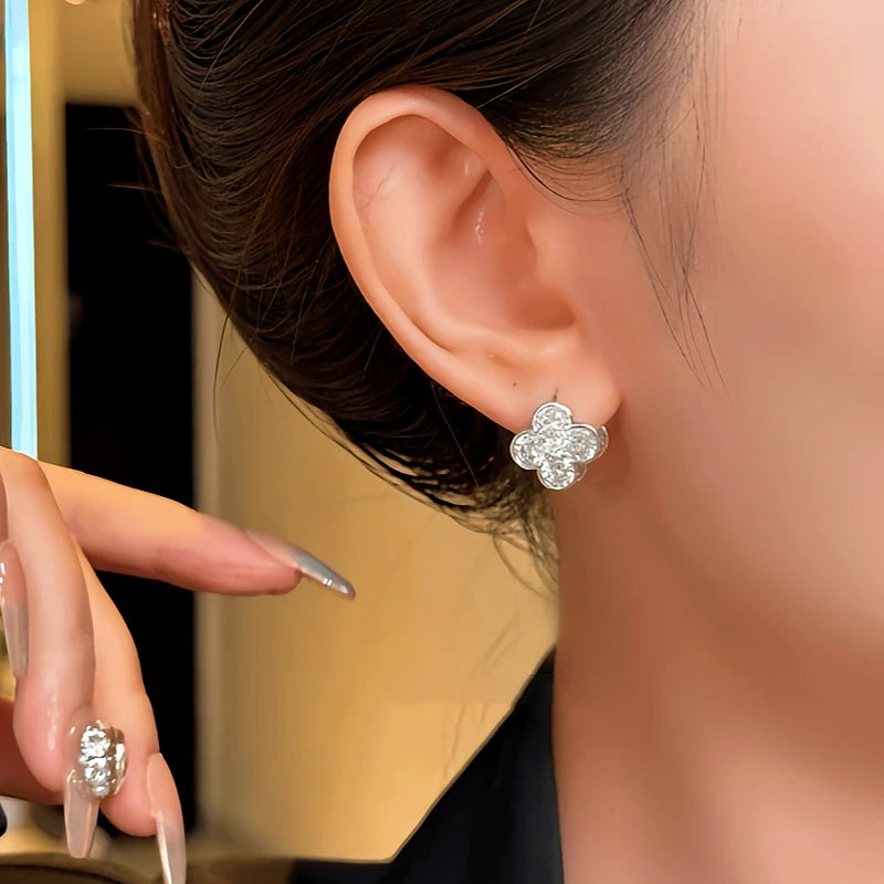 Close-up detail of the sparkling zircons and plating on the Reversible Clover Studs