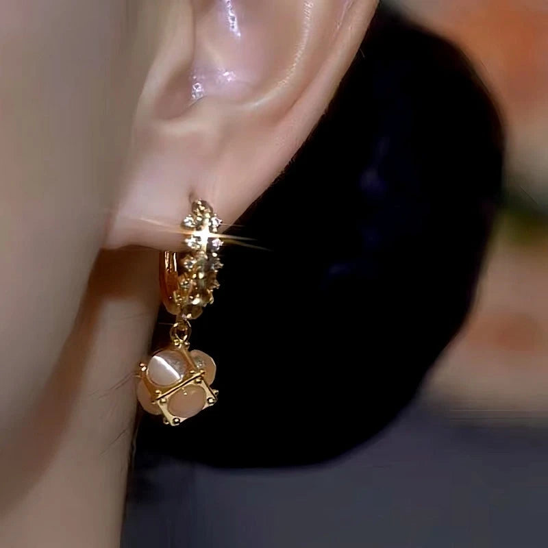 Close-up detail of the sparkling zircons and plating on the Coffee Colored Earrings