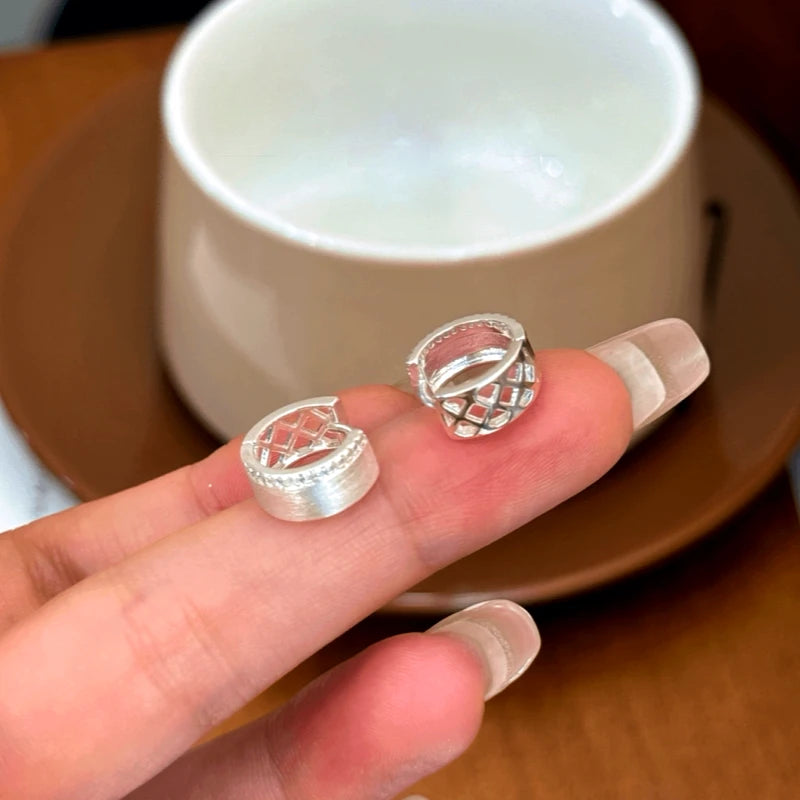 Angled view of the 14K Gold-Pated Zircon Hollow Hoop Earrings