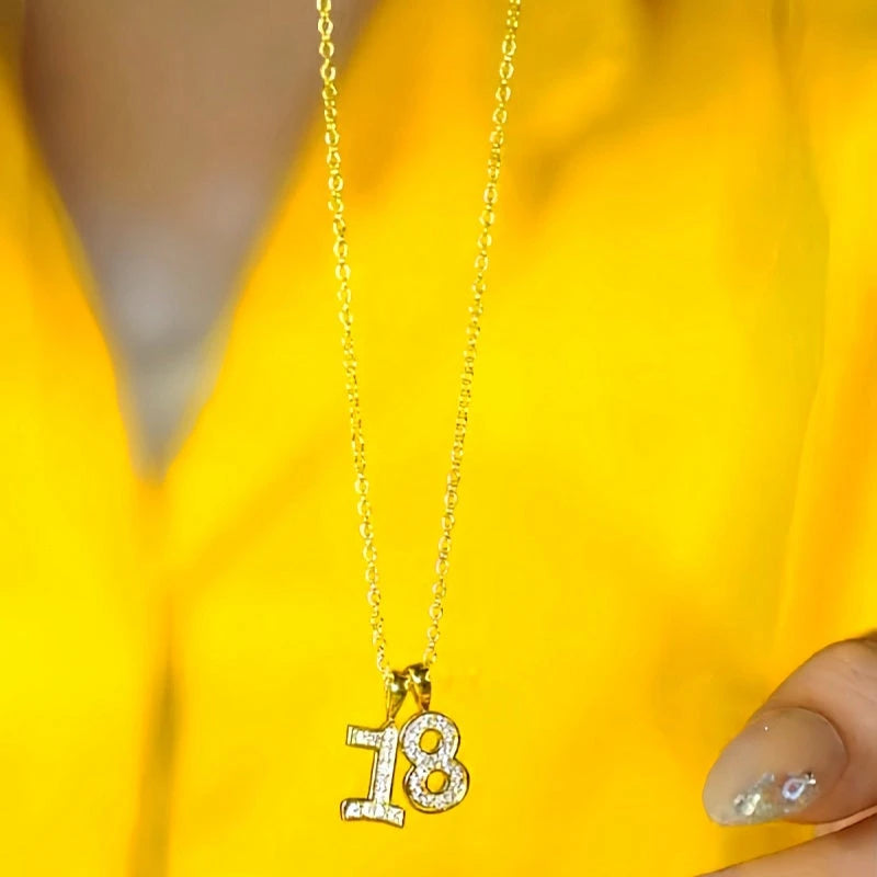 Detailed view of the 14K Gold-Plated 18 Years Be Young Necklace chain and pendant