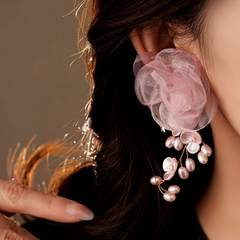 Angled view of the 14K Gold-Plated 2025 Elegant Mesh Flower Pearl Tassel Earrings