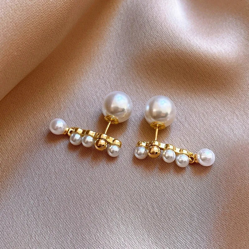 Angled view of the 14K Gold-Plated 2025 Elegant Pearl Earrings