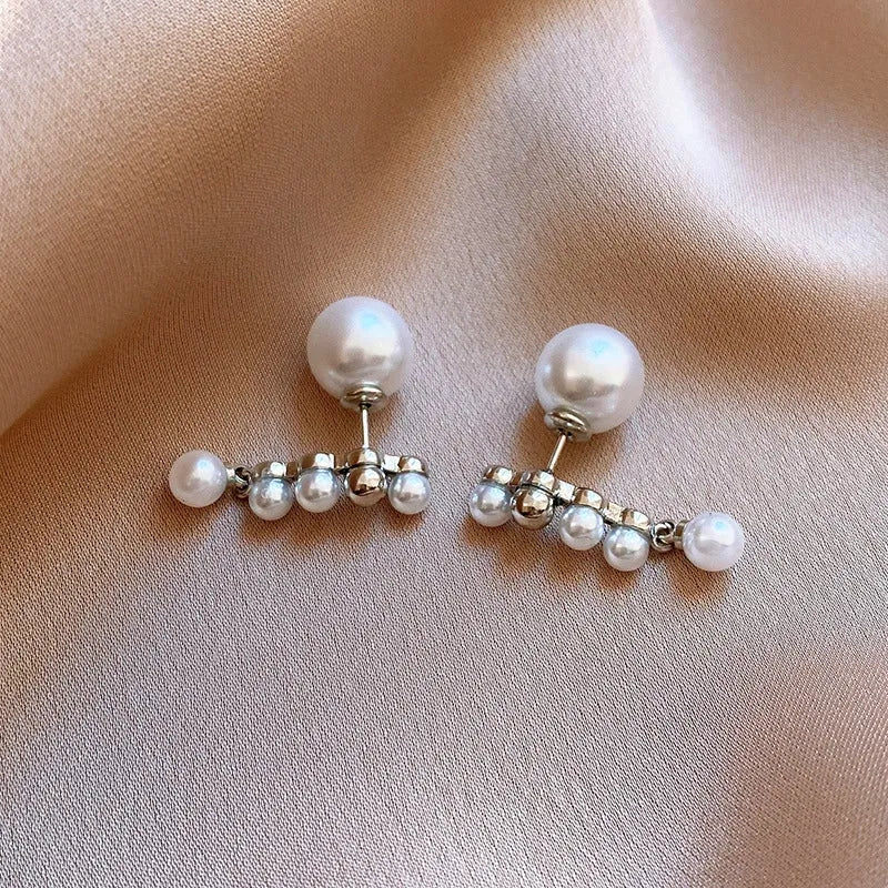 Perfect gold pearl earrings for adding glamour to any outfit