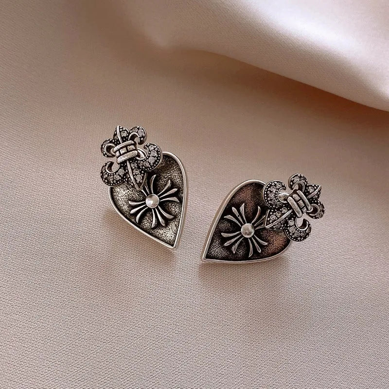 Close-up detail of the sparkling zircons and plating on the gold jacket earrings