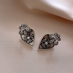 Close-up detail of the sparkling zircons and plating on the gold jacket earrings