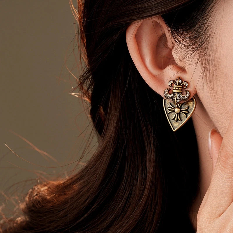 Angled view of the 14K Gold-Plated 2025 Elegant Two-Piece Earrings