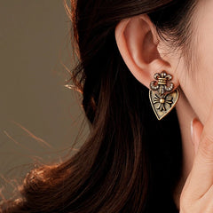 Angled view of the 14K Gold-Plated 2025 Elegant Two-Piece Earrings