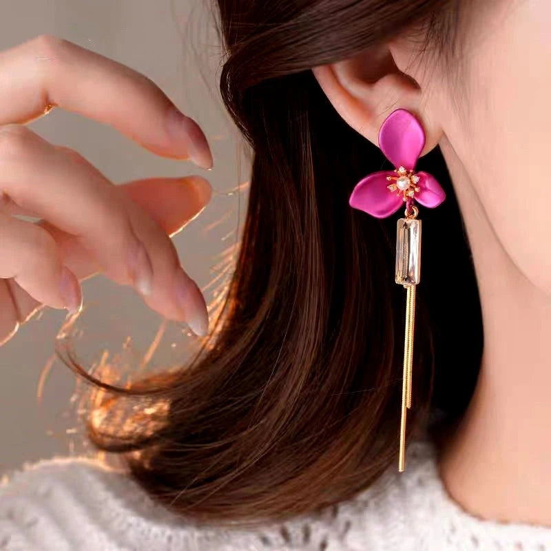 Angled view of the 14K Gold-Plated 2025 Elegant Zircon Diamond Flower Tassel Earrings