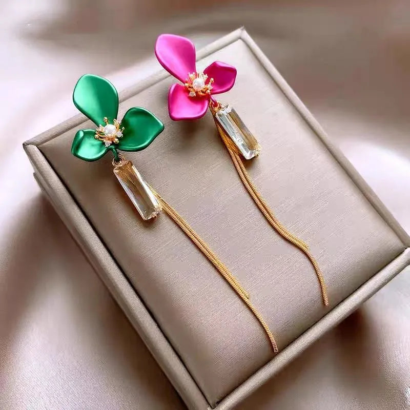 Model showcasing the dangle and style of the 14K Gold-Plated 2025 Elegant Zircon Diamond Flower Tassel Earrings