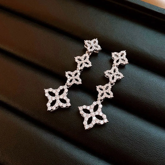 Model showcasing the dangle and style of the 14K Gold-Plated 2025 Elegant Zircon Flower Tassel Earrings