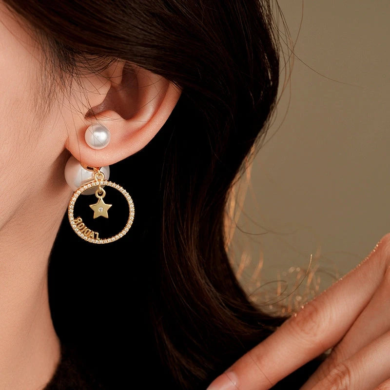 Angled view of the 14K Gold-Plated 2025 Elegant Zircon Round Pearl Earrings