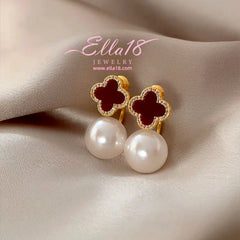 Close-up detail of the sparkling zircons and plating on the clover earrings