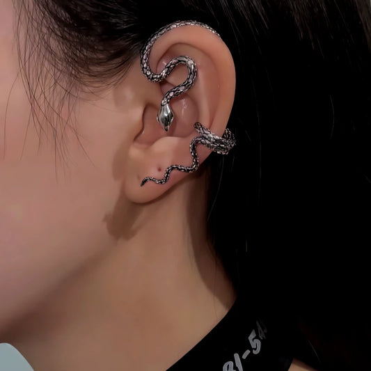 Model showcasing the dangle and style of the 14K Gold-Plated 2025 Snake Ear Cuffs ( 1 Pair  )