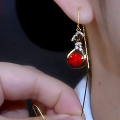 Model showcasing the dangle and style of the 14K Gold-Plated 2025 [lucky bag] Threader Earrings
