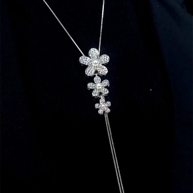 14K Gold-Plated Adjustable Flower Sweater Chain Necklace worn to showcase its length and pendant detail