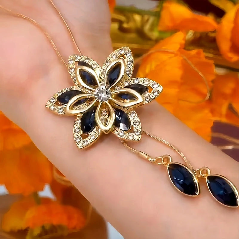 14K Gold-Plated Adjustable Flower Tassel Sweater Chain Necklace worn to showcase its length and pendant detail