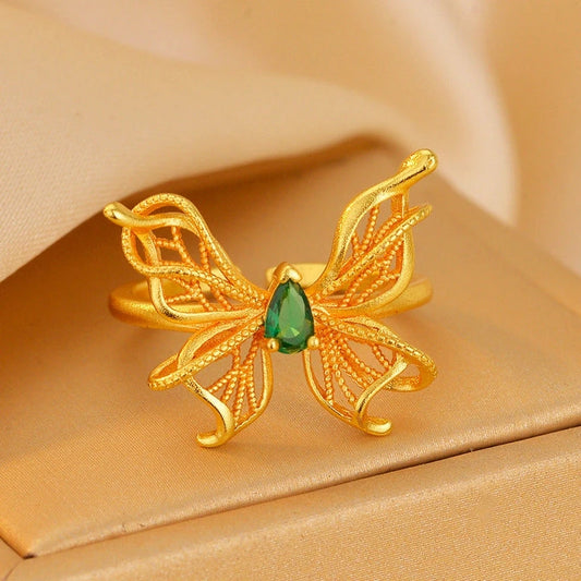 14K Gold-Plated Adjustable Green Diamond Hollow Filigree Butterfly Rings worn on the hand to show its beautiful fit and design