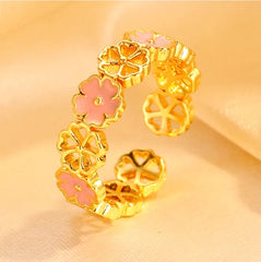 Top-down view of the sparkling 14K Gold-Plated Adjustable Hollow Cherry Blossom Rings