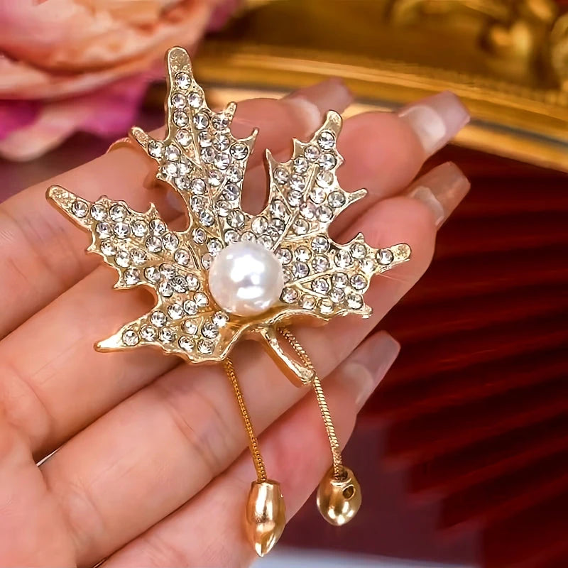 14K Gold-Plated Adjustable Maple Leaf Sweater Chain Necklace worn to showcase its length and pendant detail