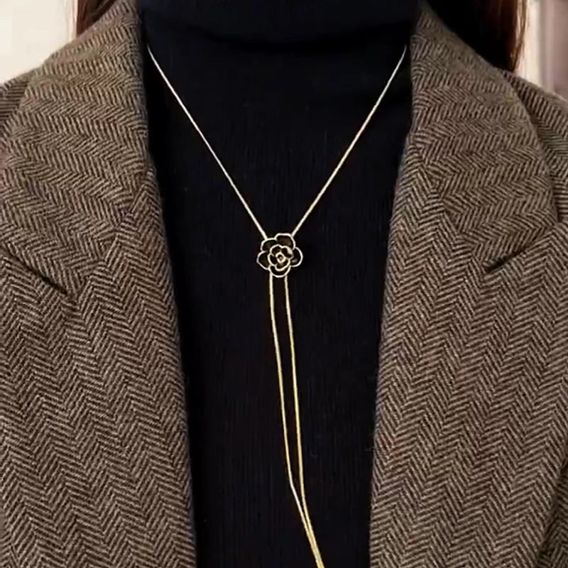 Detailed view of the 14K Gold-Plated Adjustable Rose Tassel Necklaces chain and pendant