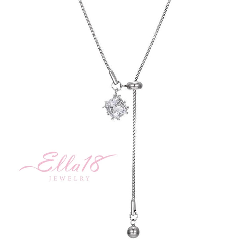 Close-up of the pendant and clasp on the silver solitaire necklace