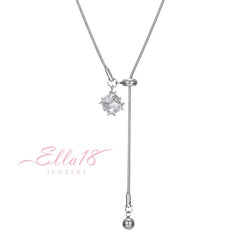 Close-up of the pendant and clasp on the silver solitaire necklace