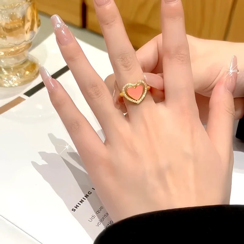 Top-down view of the sparkling 14K Gold-Plated Adjustable Zircon Diamond Pink Heart Rings