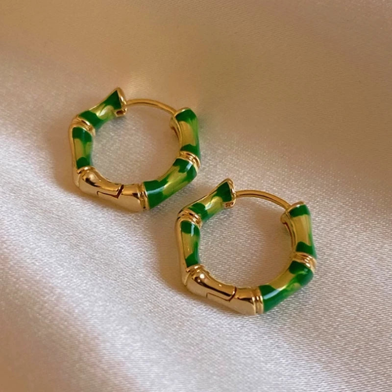 Angled view of the 14K Gold-Plated Bamboo Hoop Earrings