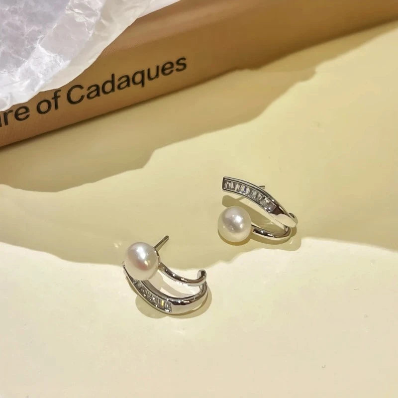 Angled view of the 14K Gold-Plated Beaded Diamond Earrings