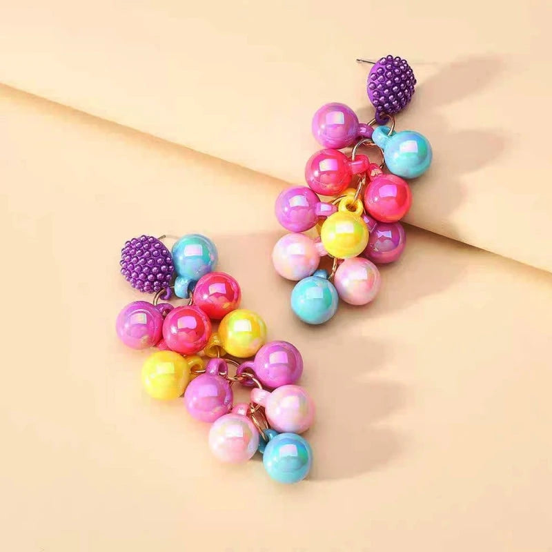 Angled view of the 14K Gold-Plated Beads Tassel Earrings