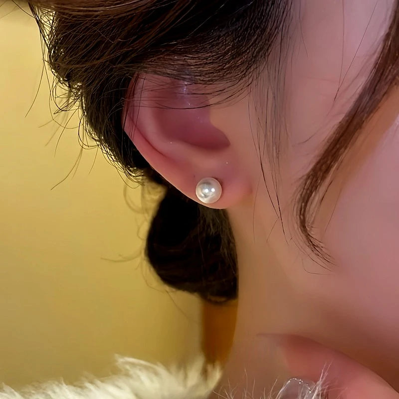 Angled view of the 14K Gold-Plated Beads Zircon Cat's Eye Flower Jacket Earrings