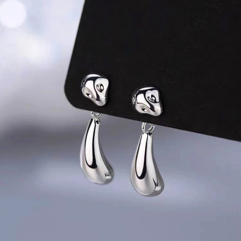 Angled view of the 14K Gold-Plated Bean Drop Earrings