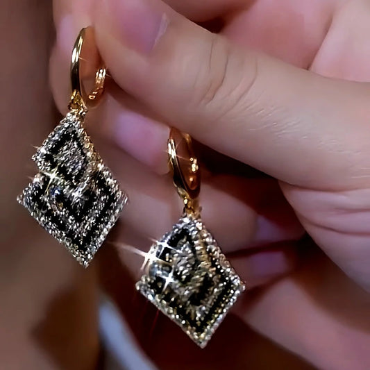 14K Gold-Plated Black And White Diamond Tassel Earrings - elegant gold tassel earrings