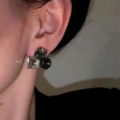 Close-up detail of the sparkling zircons and plating on the Black Diamond Studs