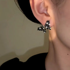 Close-up detail of the sparkling zircons and plating on the Zircon Butterfly Earrings