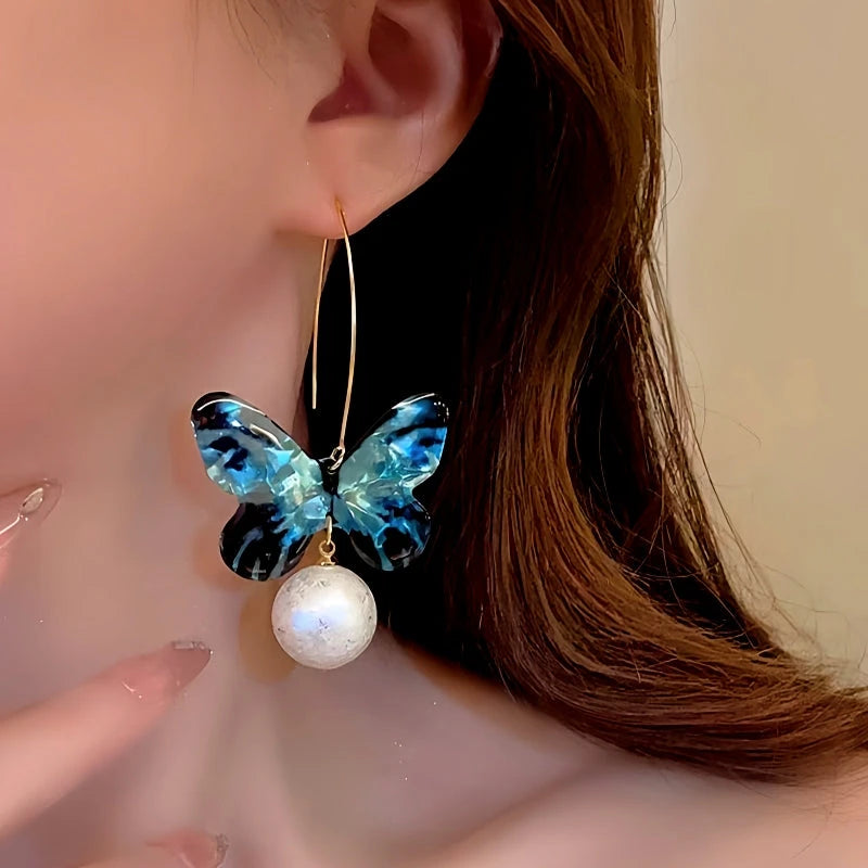 Close-up detail of the sparkling zircons and plating on the Butterfly Ear Hook