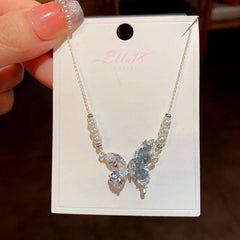 14K Gold-Plated Blue Crystal Splicing Butterfly Pearl Necklaces worn to showcase its length and pendant detail
